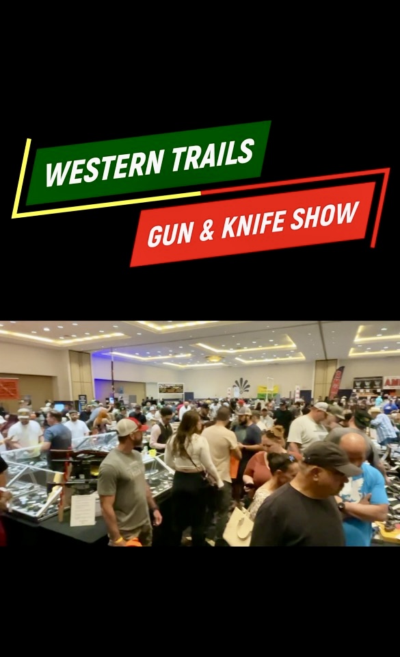 Western Trails gun and knife show crowd inside an exhibition hall